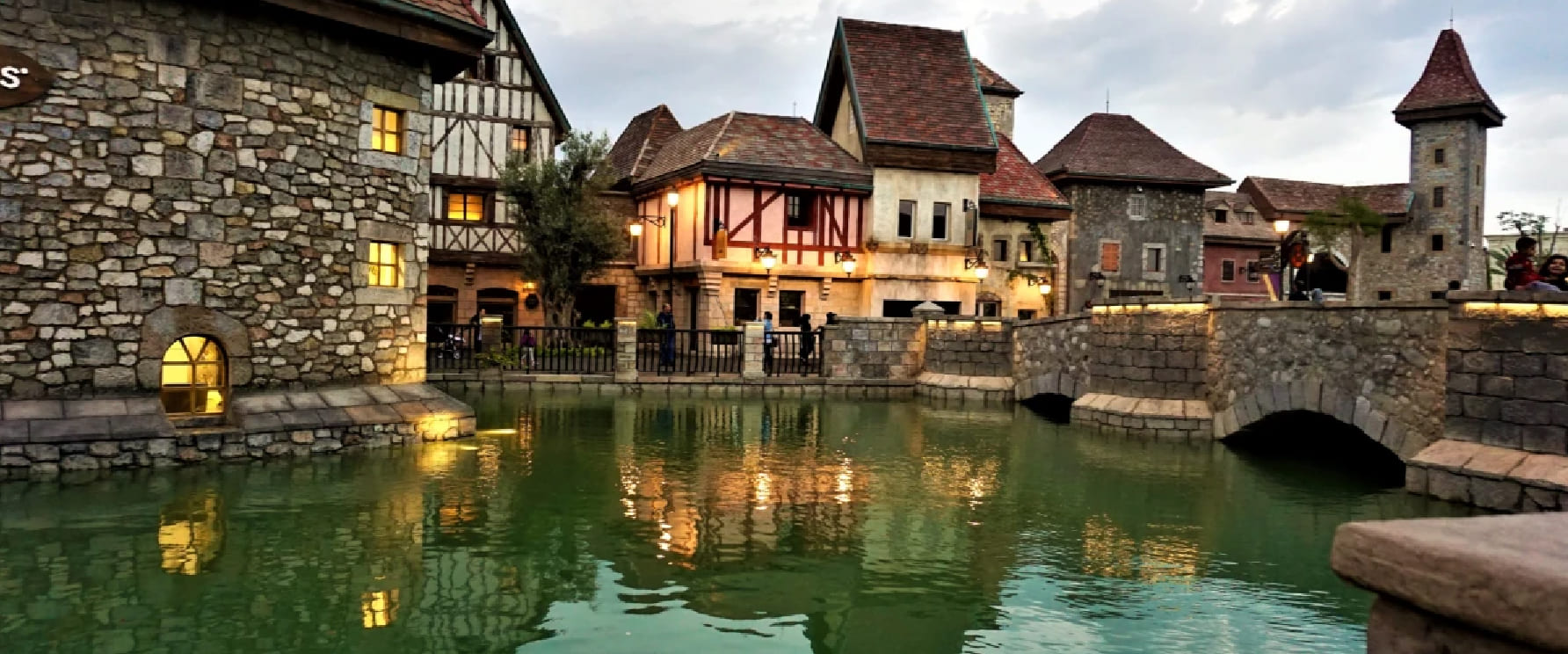 Riverland Dubai free-to-enter themed walking district with canals at Dubai Parks