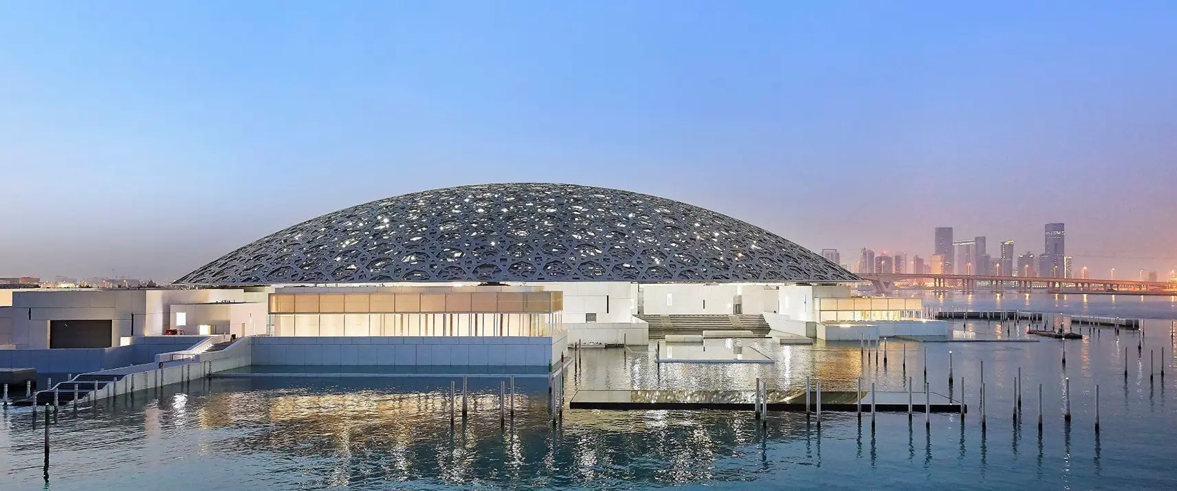 Louvre Abu Dhabi silver dome with rain of light on Saadiyat Island