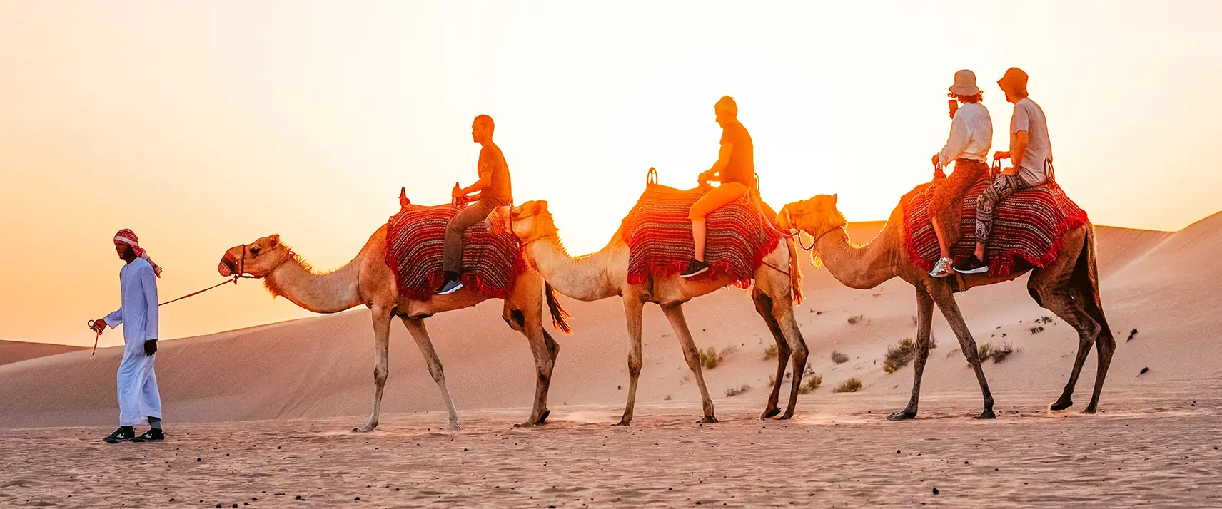 Abu Dhabi desert safari in January with dune bashing and camel rides