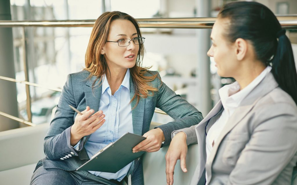 HR professional interviewing a candidate in Dubai office