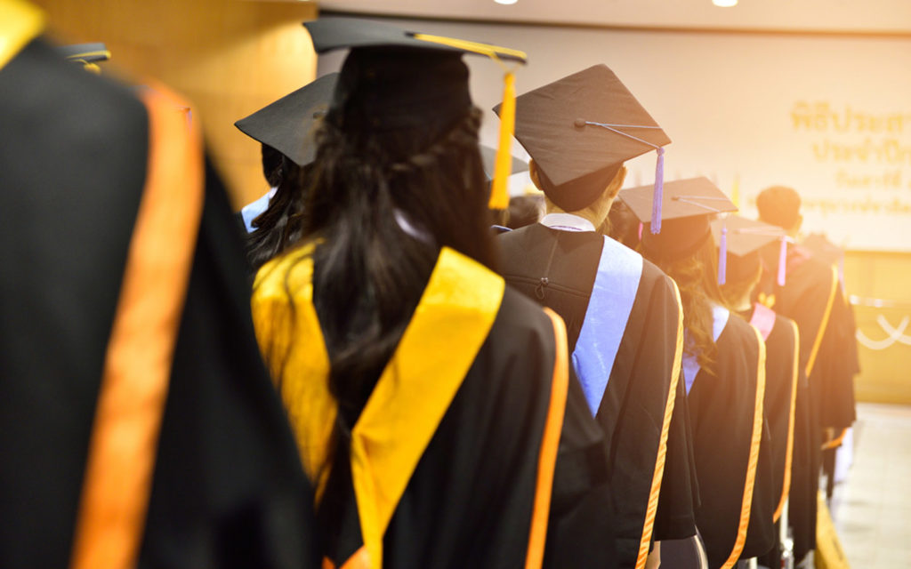 UAE Ministry of Education graduation ceremony with students in gowns