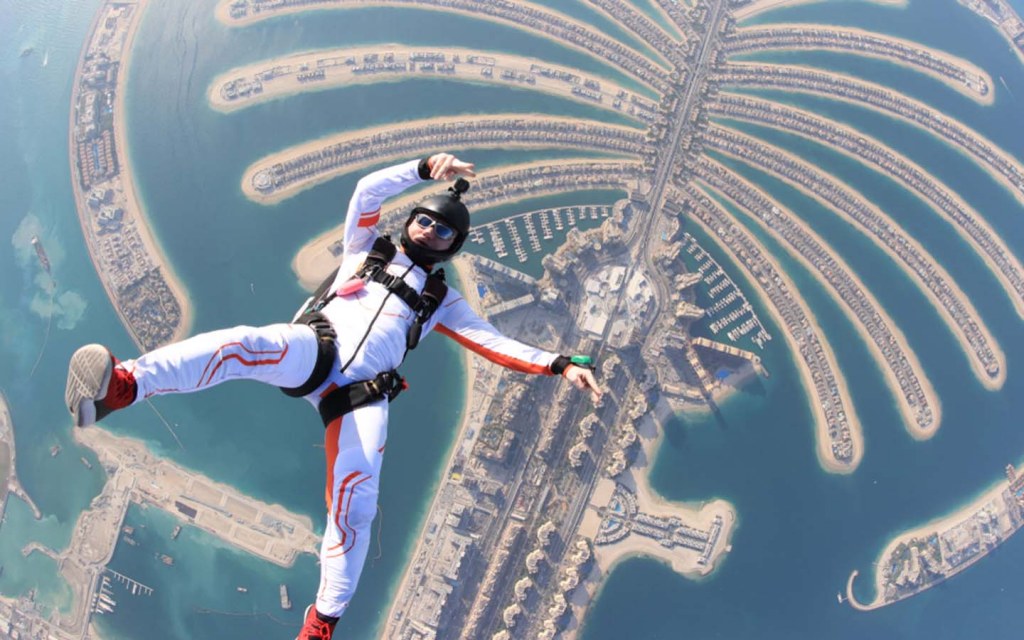 Skydiving over Palm Jumeirah with palm-shaped island view