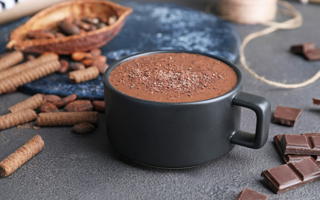 Rich Parisian-style hot chocolate served with spices and chocolate chunks in Dubai