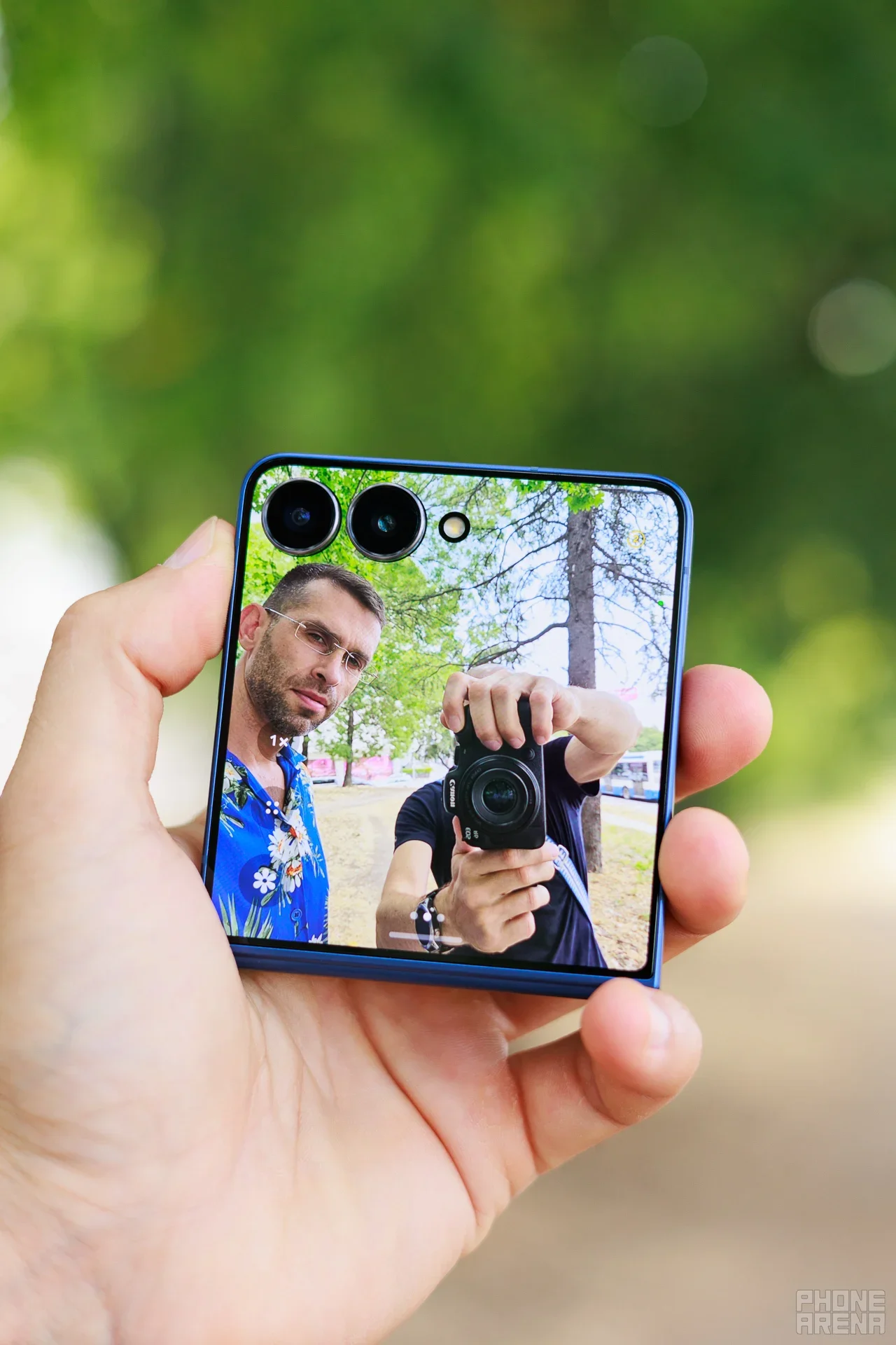 Selfie captured with a Samsung-style foldable phone using the top screen
