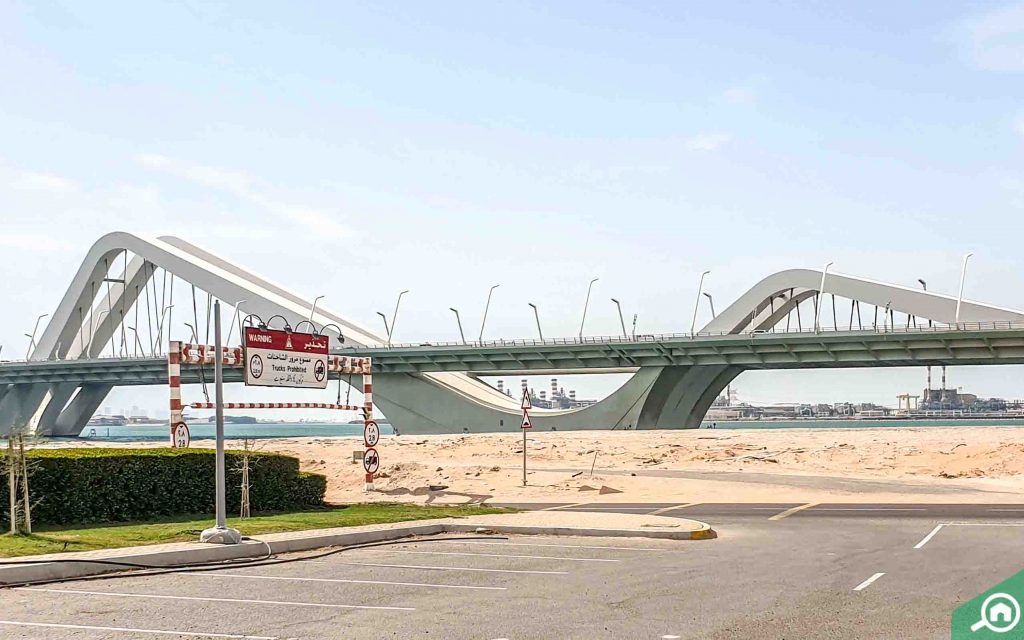 Sheikh Zayed Bridge by Zaha Hadid illuminated at night in Abu Dhabi