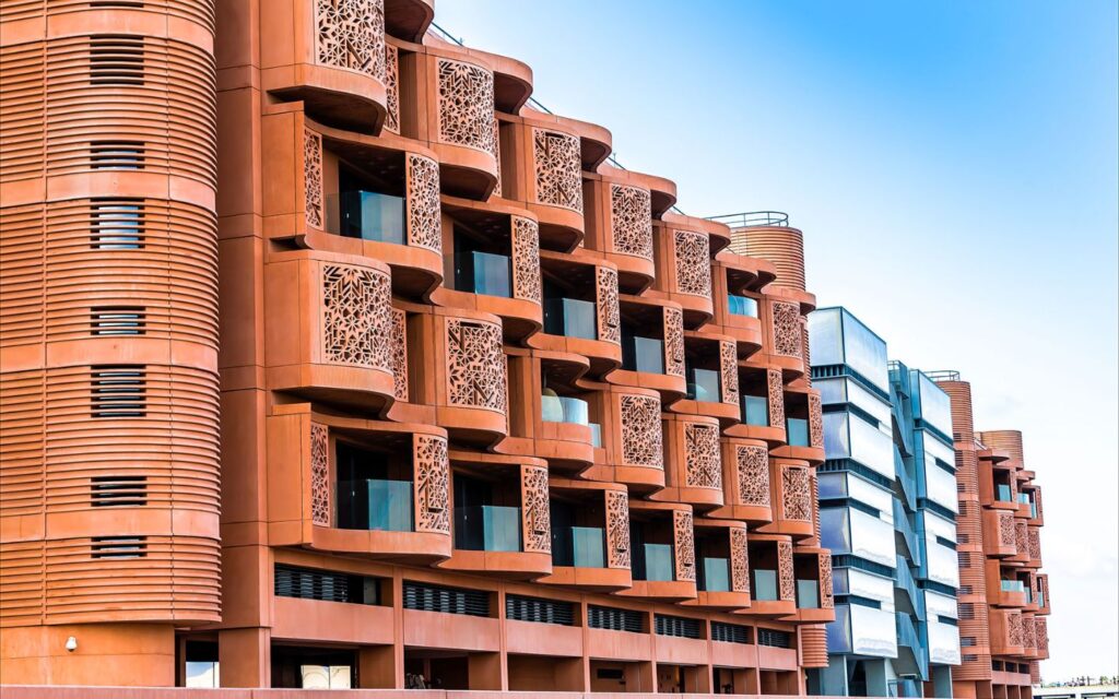 Masdar City sustainable architecture with shaded streets and solar panels in Abu Dhabi