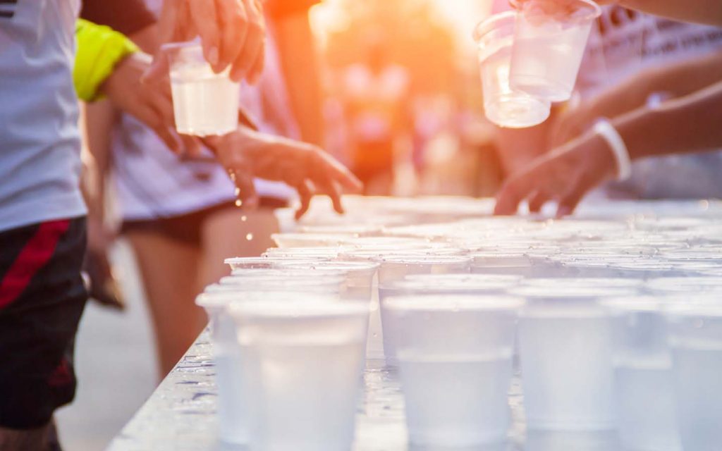 Hydration station and support crews at the Dubai Marathon