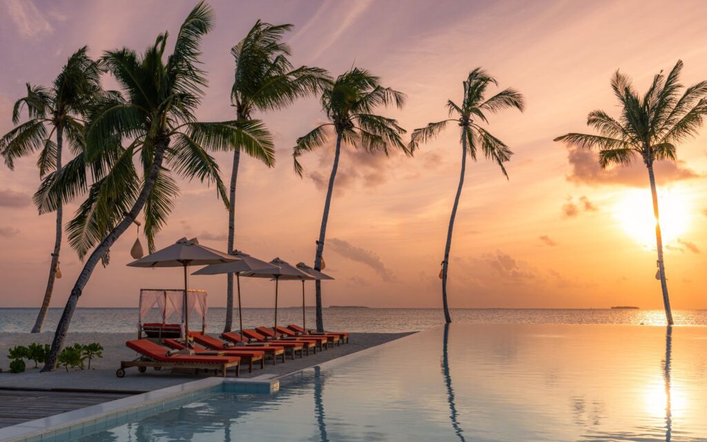 Poolside loungers and umbrellas at an Abu Dhabi beach resort