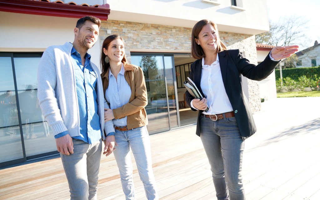 RERA-certified real estate agent advising homebuyer in Dubai