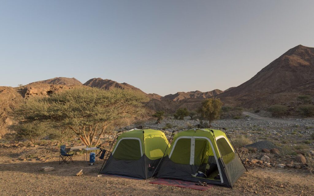 Campground at Hatta with mountains, tents and fire pits