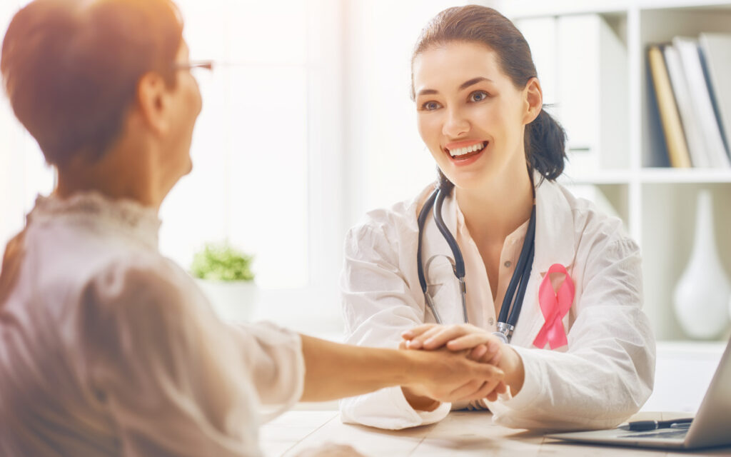 women consulting doctor during Pinktober breast cancer awareness in Dubai